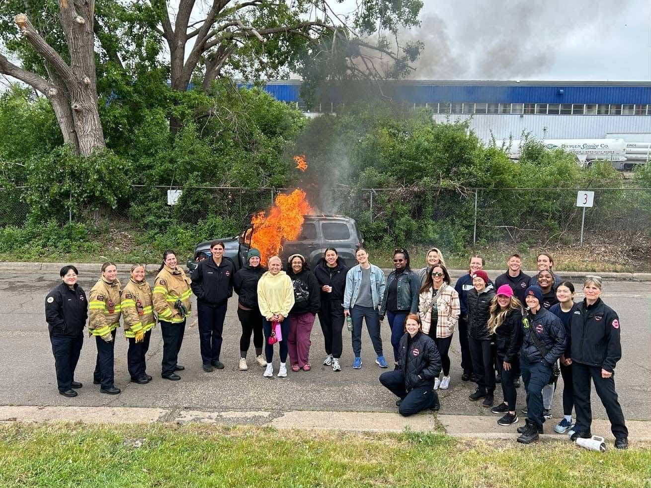 TCF3 participants and firefighters at a live fire training exercise