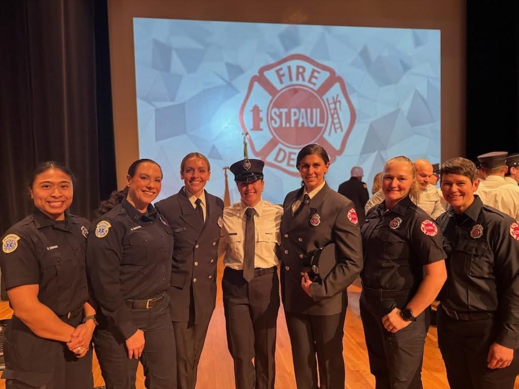 Women firefighters gathered at a St. Paul Fire Department ceremony